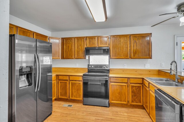 1510 Walnut Hills Dr, Chapel Hill, TN 37034 - kitchen with appliances with stainless steel finishes, ceiling fan, light countertops, and brown cabinetry