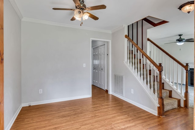 1510 Walnut Hills Dr, Chapel Hill, TN 37034 - staircase with ceiling fan, wood finished floors, and ornamental molding