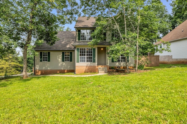 1510 Walnut Hills Dr, Chapel Hill, TN 37034 - rear view of house with a lawn and a shingled roof