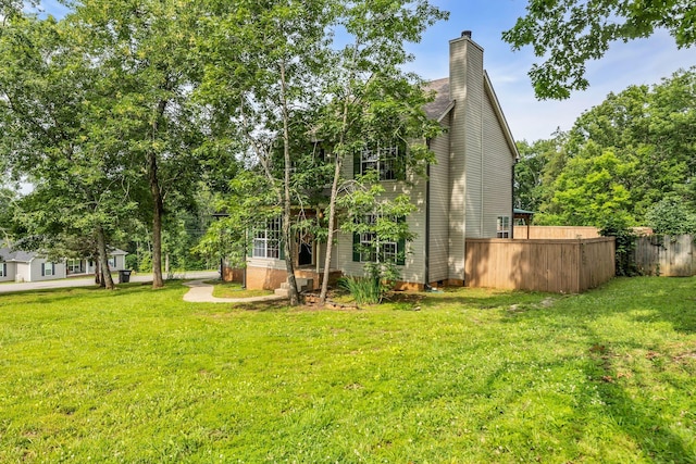1510 Walnut Hills Dr, Chapel Hill, TN 37034 - rear view of house with a chimney