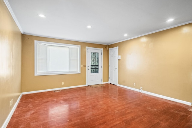 723 Vanderhorst Dr, Nashville, TN 37207 - spare room featuring crown molding, wood finished floors, baseboards, and recessed lighting