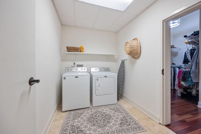 891 Fairington Pvt Way, Gallatin, TN 37066 - washroom featuring independent washer and dryer, baseboards, and light tile patterned floors