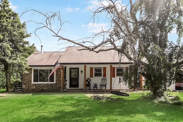 3033 Greer Rd, Goodlettsville, TN 37072 - rear view of house with a shingled roof, a yard, and covered porch