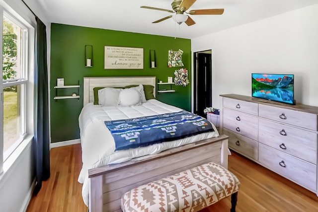 3033 Greer Rd, Goodlettsville, TN 37072 - bedroom with wood finished floors, a ceiling fan, and baseboards