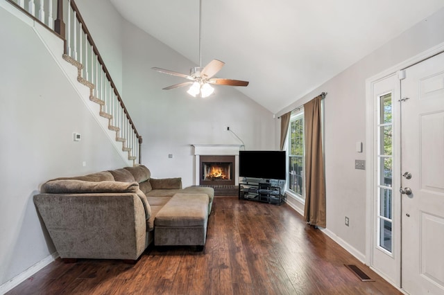 1012 Blue Ridge Pkwy, Goodlettsville, TN 37072 - living room with lofted ceiling, a warm lit fireplace, wood finished floors, a ceiling fan, and stairway