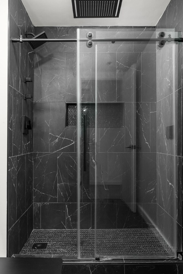 600 12th Ave S Unit 1208, Nashville, TN 37203 - bathroom with a marble finish shower
