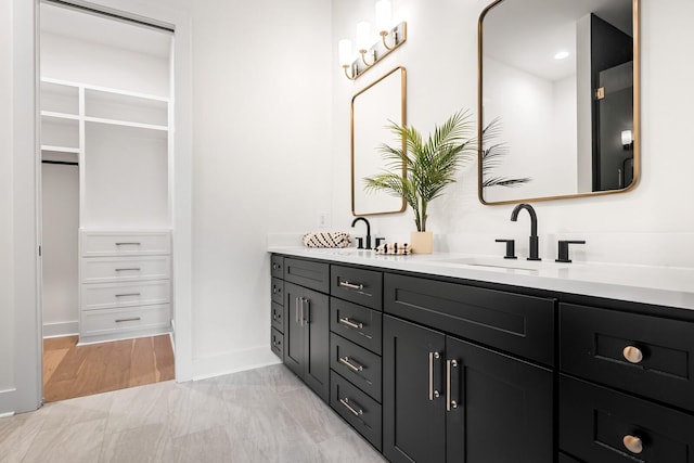 6104 Cowden Ave Unit A, Nashville, TN 37209 - full bath featuring double vanity, baseboards, and a spacious closet