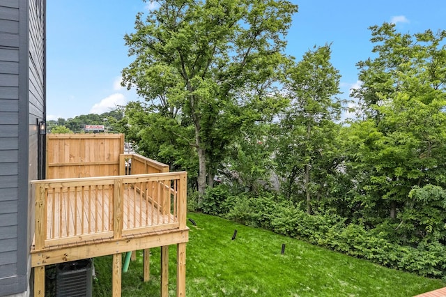 6104 Cowden Ave Unit A, Nashville, TN 37209 - view of green lawn featuring a wooden deck and view of wooded area