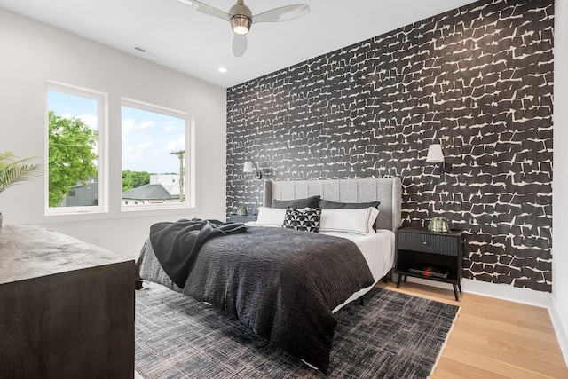 6104 Cowden Ave Unit A, Nashville, TN 37209 - bedroom with wood finished floors, a ceiling fan, and recessed lighting