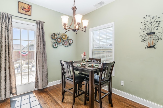 1026 Grace Meade, Ashland City, TN 37015 - dining space with a chandelier, wood finished floors, and plenty of natural light