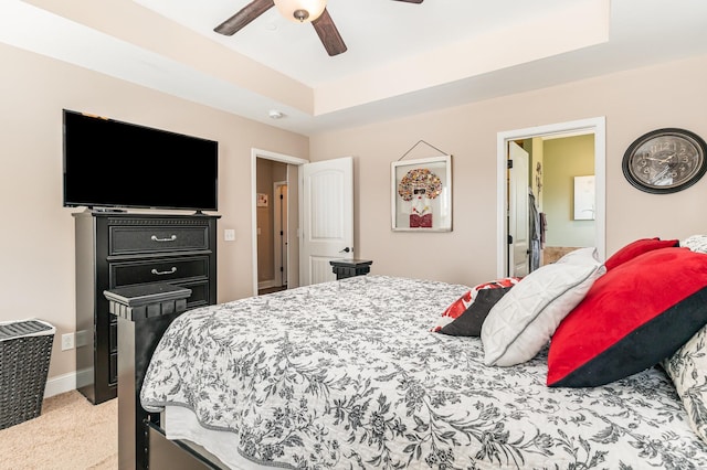 1026 Grace Meade, Ashland City, TN 37015 - bedroom featuring a raised ceiling, light colored carpet, ceiling fan, and connected bathroom