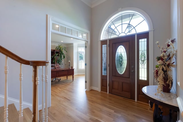 205 Saint Anne Way, Franklin, TN 37064 - entryway with light wood-style flooring, ornamental molding, and baseboards