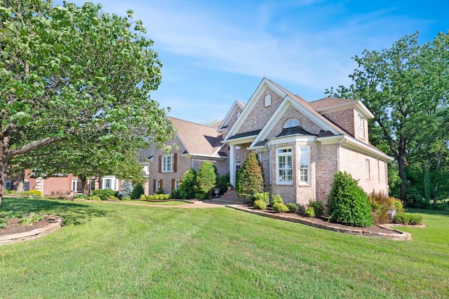 205 Saint Anne Way, Franklin, TN 37064 - view of front facade featuring brick siding and a front lawn