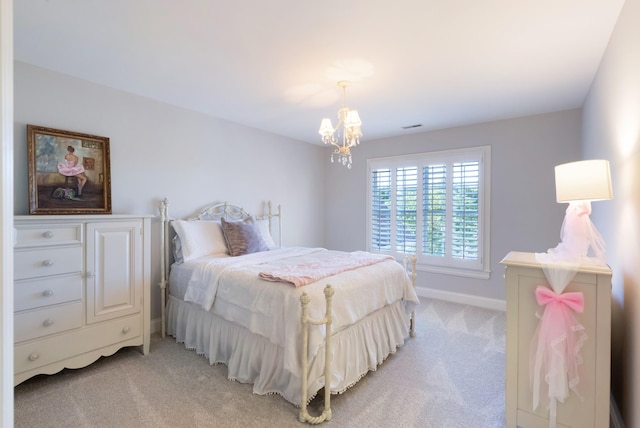 205 Saint Anne Way, Franklin, TN 37064 - bedroom featuring light carpet, a chandelier, and baseboards
