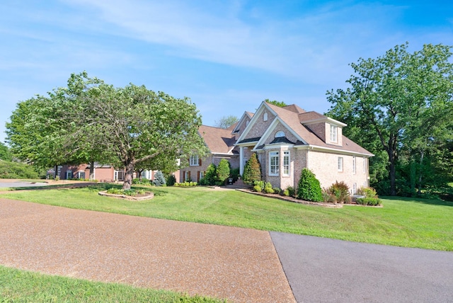 205 Saint Anne Way, Franklin, TN 37064 - view of front of house featuring brick siding and a front lawn