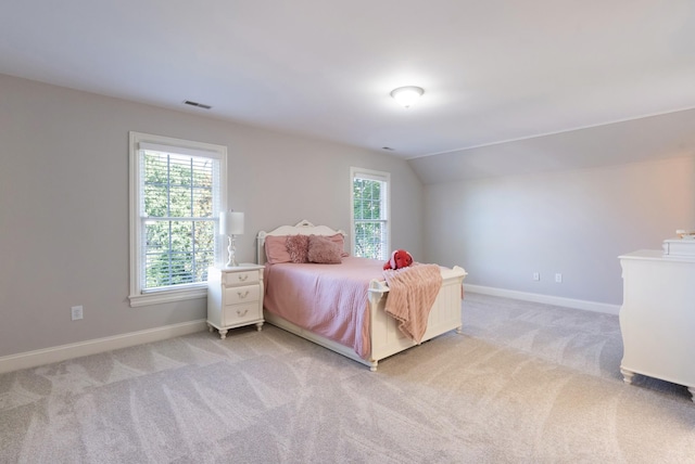 205 Saint Anne Way, Franklin, TN 37064 - bedroom with light colored carpet, baseboards, multiple windows, and vaulted ceiling