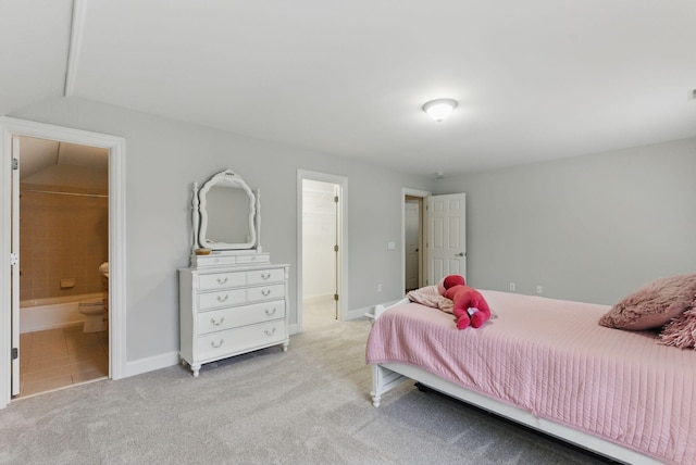 205 Saint Anne Way, Franklin, TN 37064 - bedroom featuring light carpet, ensuite bathroom, and baseboards