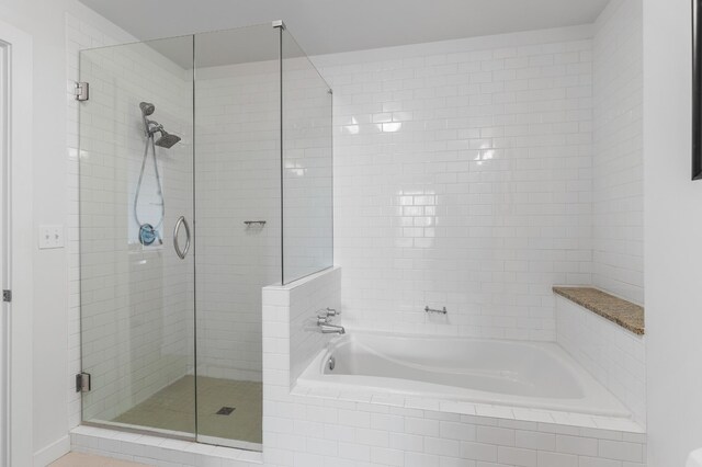 900 20th Ave S Unit 909, Nashville, TN 37212 - bathroom with a shower stall and a bath