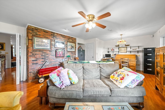 1711 Lovers Ln, Hopkinsville, KY 42240 - living room featuring a ceiling fan, wood finished floors, and brick wall
