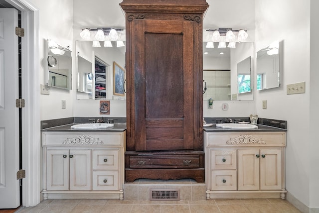 1711 Lovers Ln, Hopkinsville, KY 42240 - full bath featuring two vanities and tile patterned flooring