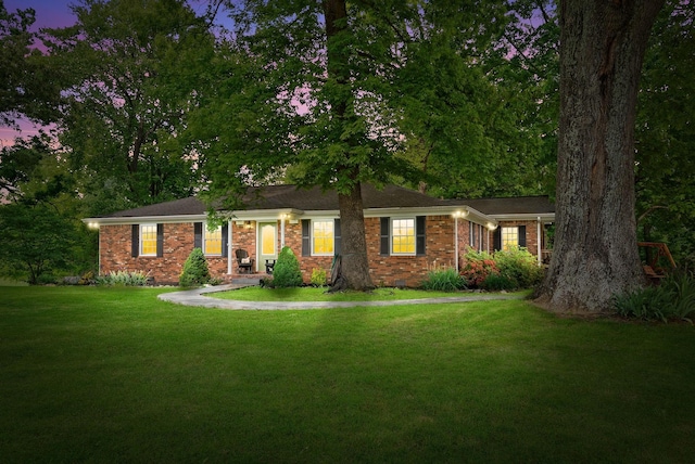 1711 Lovers Ln, Hopkinsville, KY 42240 - single story home featuring a front yard and brick siding