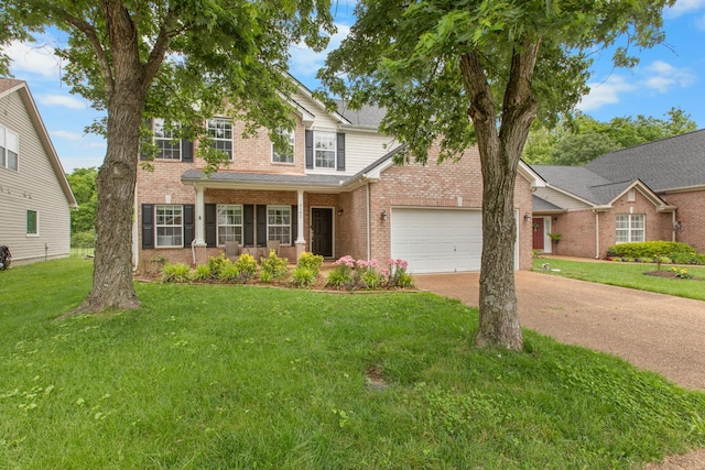 3182 Tristan Dr, Franklin, TN 37064 - traditional-style home featuring brick siding, driveway, a front yard, and a garage