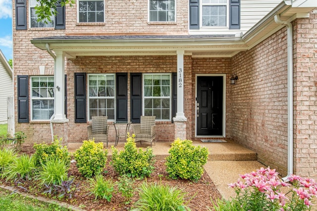 3182 Tristan Dr, Franklin, TN 37064 - property entrance featuring a porch and brick siding