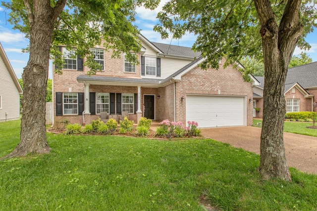 3182 Tristan Dr, Franklin, TN 37064 - view of front of house featuring a garage, brick siding, and a front lawn