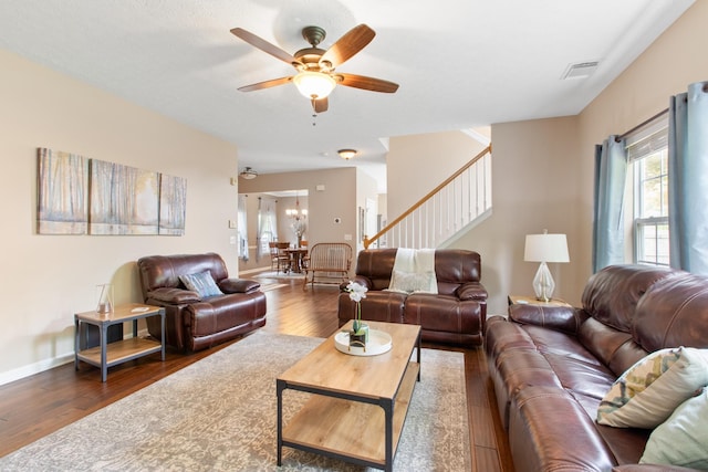 3182 Tristan Dr, Franklin, TN 37064 - living area featuring wood finished floors, a ceiling fan, stairs, and baseboards