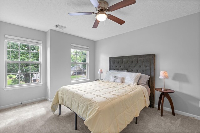 3182 Tristan Dr, Franklin, TN 37064 - bedroom featuring light carpet, baseboards, ceiling fan, and a textured ceiling