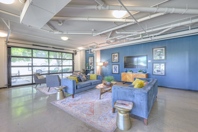 1900 12th Ave S Unit 406, Nashville, TN 37203 - living area featuring concrete flooring