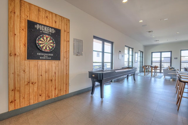 1900 12th Ave S Unit 406, Nashville, TN 37203 - rec room featuring recessed lighting, baseboards, and wood walls