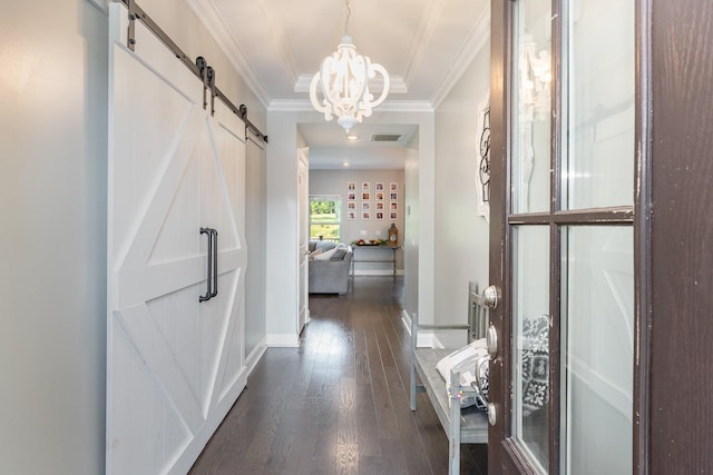 1717 Boardwalk Pl, Gallatin, TN 37066 - hallway featuring a barn door, ornamental molding, dark wood-style floors, baseboards, and a chandelier