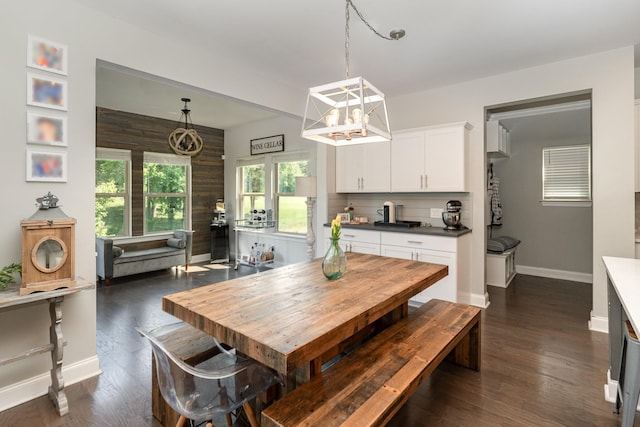 1717 Boardwalk Pl, Gallatin, TN 37066 - dining room with baseboards, dark wood finished floors, and a chandelier