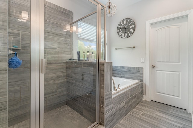 1717 Boardwalk Pl, Gallatin, TN 37066 - bathroom with a garden tub and a stall shower
