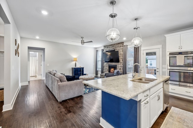 1151 Cotillion Dr, Murfreesboro, TN 37128 - kitchen with stainless steel appliances, a sink, open floor plan, healthy amount of natural light, and recessed lighting