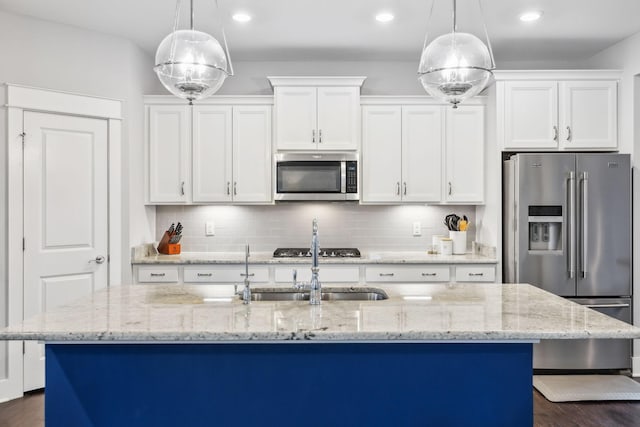 1151 Cotillion Dr, Murfreesboro, TN 37128 - kitchen with appliances with stainless steel finishes, white cabinets, a sink, backsplash, and recessed lighting