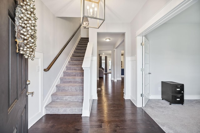 1151 Cotillion Dr, Murfreesboro, TN 37128 - foyer featuring stairs, wood finished floors, a chandelier, and baseboards