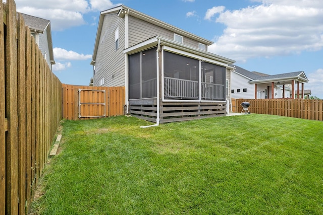 1151 Cotillion Dr, Murfreesboro, TN 37128 - rear view of house with a gate and a sunroom