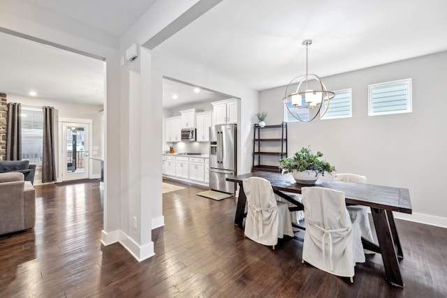 1151 Cotillion Dr, Murfreesboro, TN 37128 - dining area with healthy amount of natural light, a chandelier, baseboards, dark wood-style floors, and recessed lighting