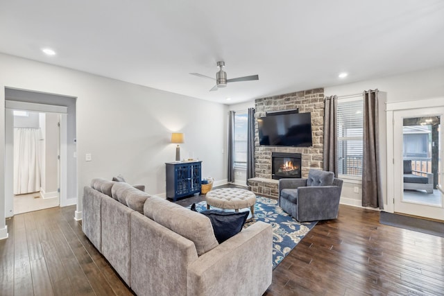 1151 Cotillion Dr, Murfreesboro, TN 37128 - living room featuring dark wood-style flooring, a fireplace, a ceiling fan, baseboards, and recessed lighting