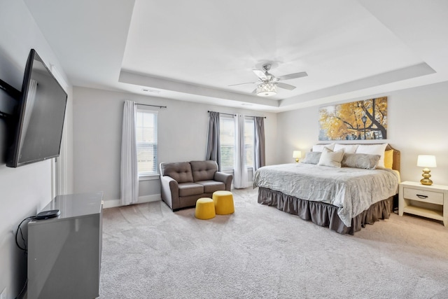 1151 Cotillion Dr, Murfreesboro, TN 37128 - bedroom with a tray ceiling, carpet floors, ceiling fan, and baseboards