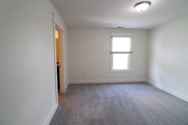 4802A Illinois Ave, Nashville, TN 37209 - empty room featuring carpet and baseboards