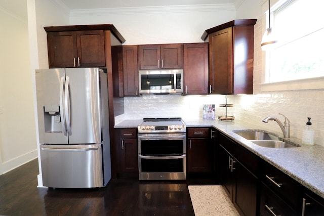 4802A Illinois Ave, Nashville, TN 37209 - kitchen featuring stainless steel appliances, a sink, backsplash, crown molding, and dark wood finished floors