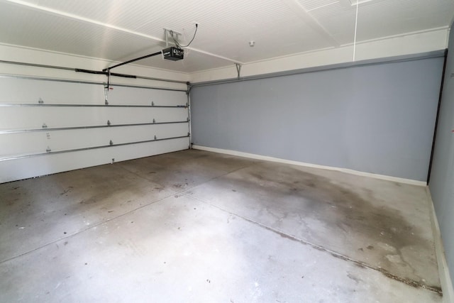 4802A Illinois Ave, Nashville, TN 37209 - garage with a garage door opener and baseboards