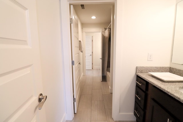 4802A Illinois Ave, Nashville, TN 37209 - bathroom with vanity, recessed lighting, and shower / bath combo