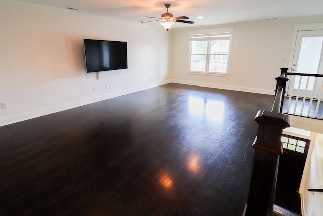 4802A Illinois Ave, Nashville, TN 37209 - unfurnished living room with dark wood-style flooring, a ceiling fan, baseboards, ornamental molding, and recessed lighting