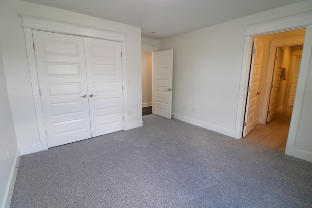 4802A Illinois Ave, Nashville, TN 37209 - unfurnished bedroom with carpet, baseboards, and a closet
