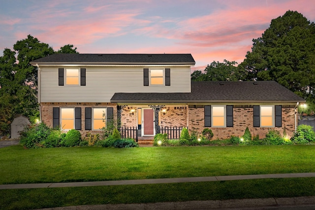 111 Woodmont Dr, Hopkinsville, KY 42240 - view of front of property featuring brick siding and a front lawn