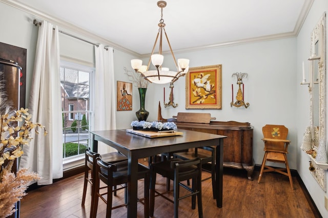 314 W 6th St Unit 7, Columbia, TN 38401 - dining space featuring a chandelier, plenty of natural light, dark wood-style flooring, and crown molding